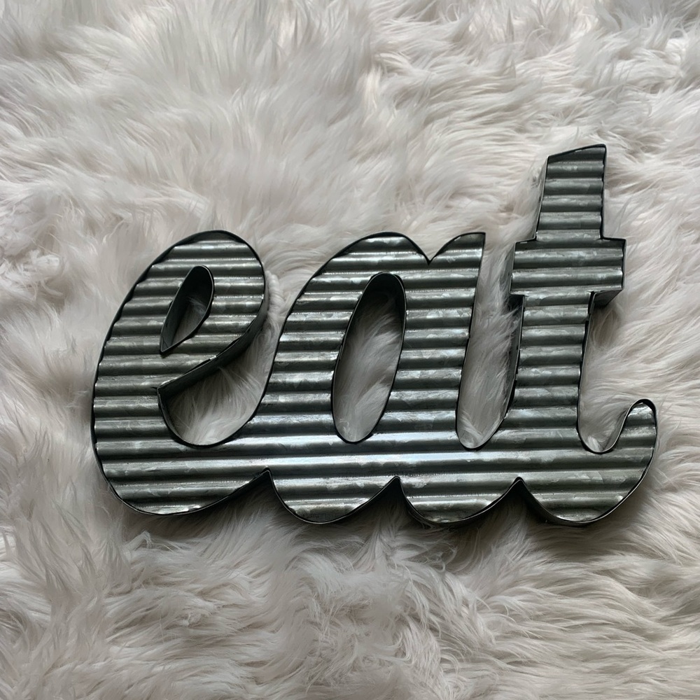 Tin sign
